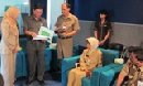 KUNJUNGAN KANTOR ARSIP DAN PERPUSTAKAAN KOTA PROBOLINGGO KE BPAD KOTA DENPASAR